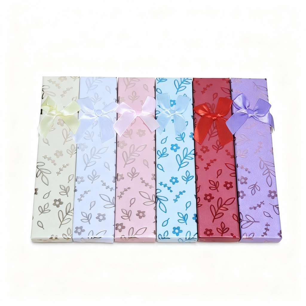 CAJA DE REGALO LARGA FLORES HOJAS